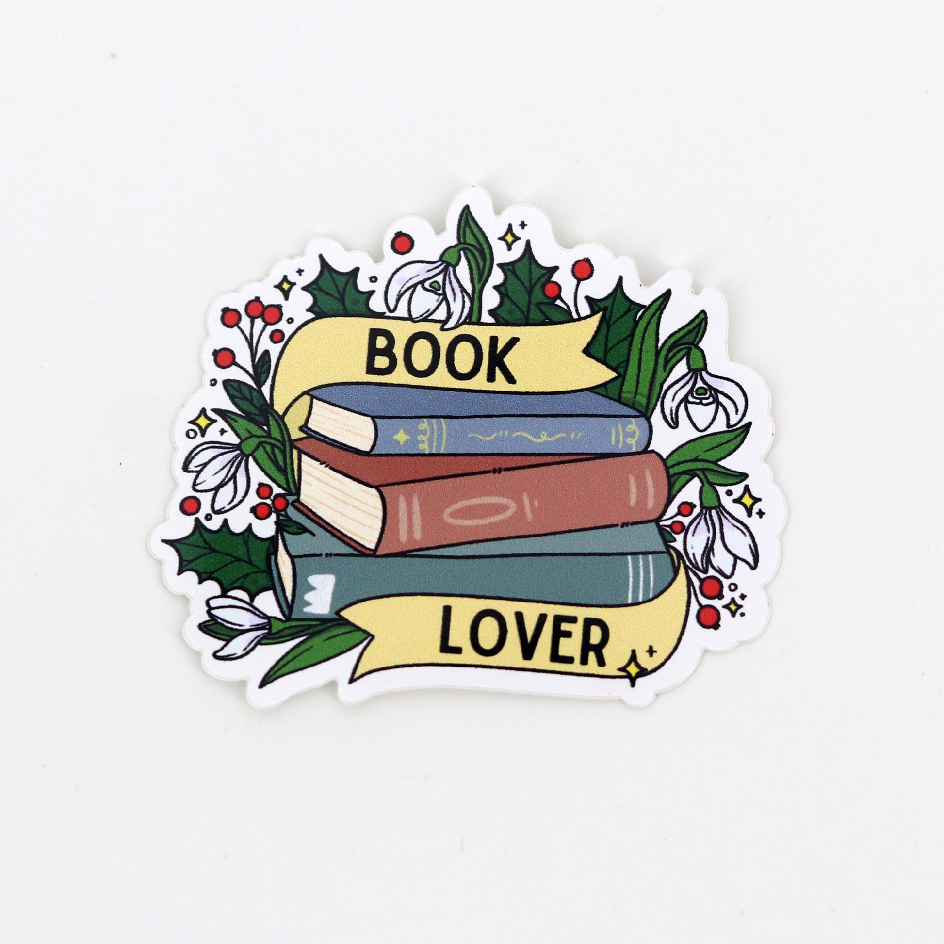 vinyl sticker metr een stapel boeken en de tekst book lover