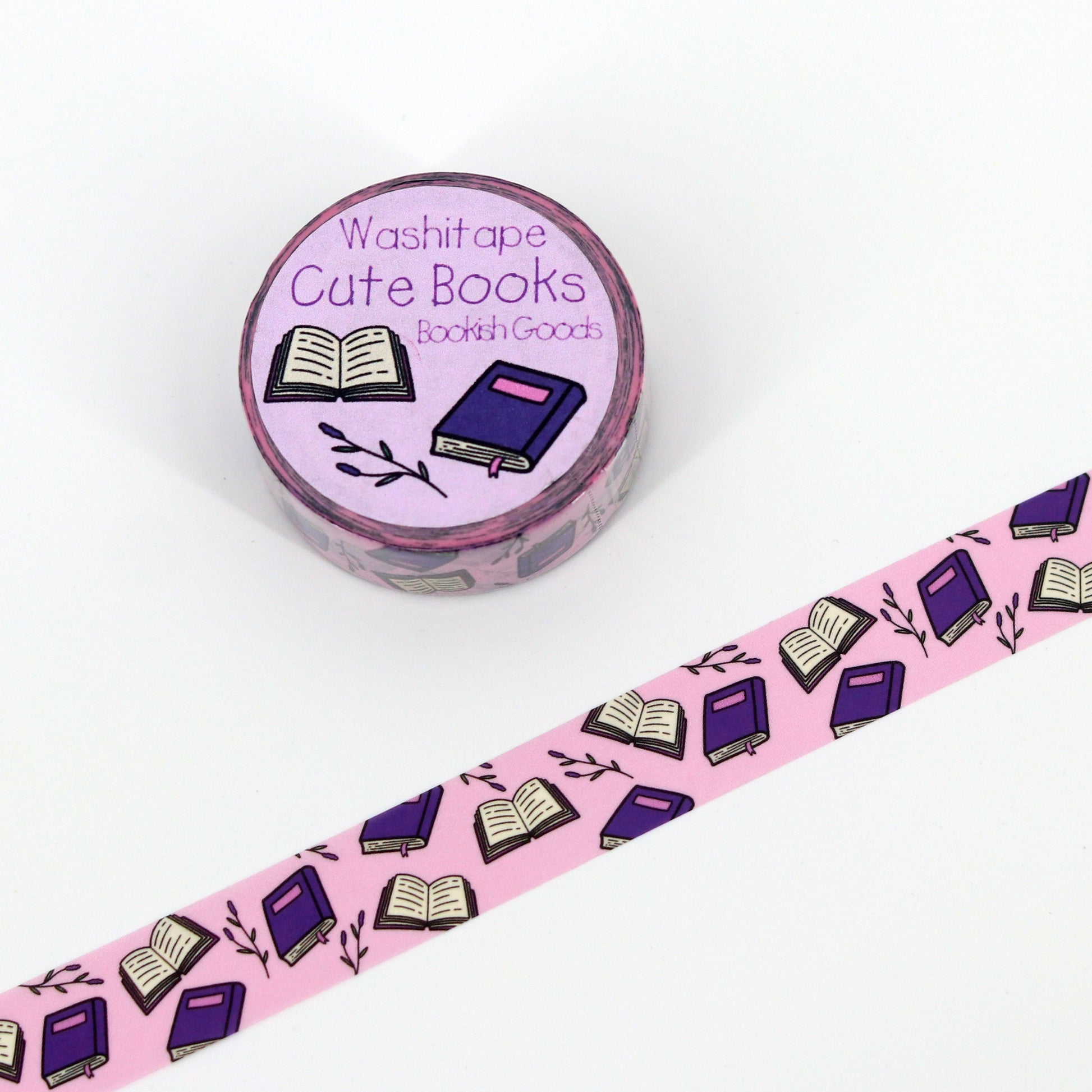 washi tape met roze achtergrond en daarop paarse boeken