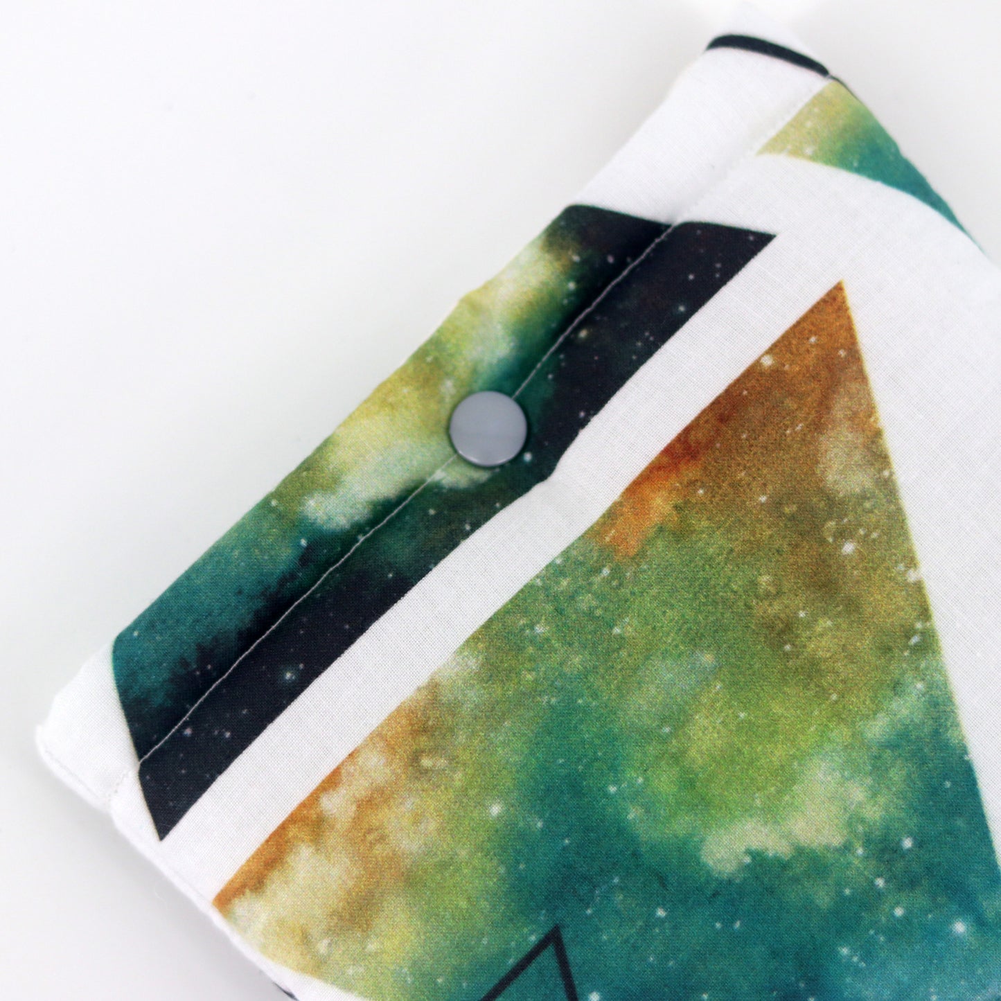 e-reader sleeve met witte achtergrond en daarop galaxy kleuren