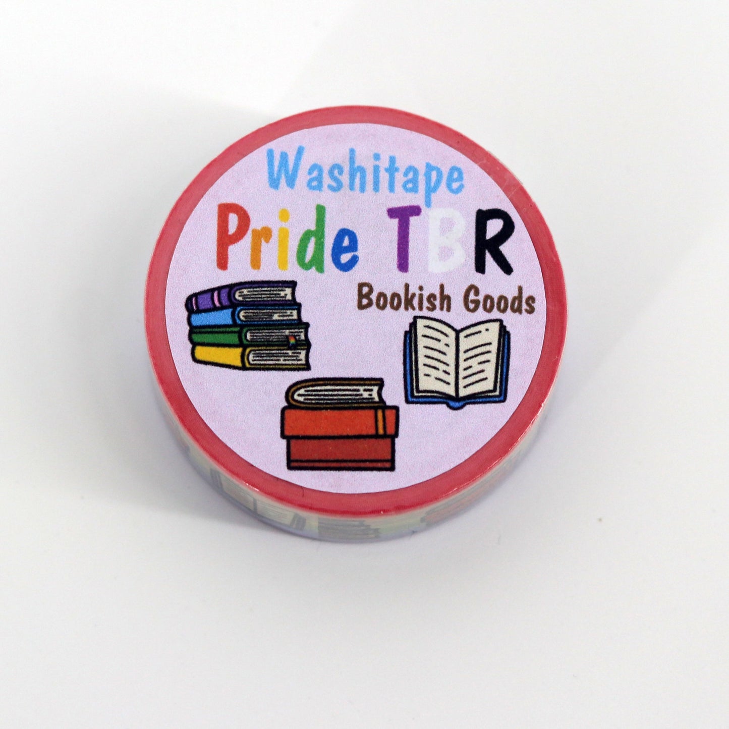 washi tape in pride thema, pride vlag op de achtergrond met daarop verschillende boeken